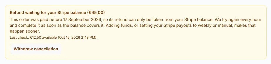 The banner explaining that a cancellation is waiting for the organizer’s Stripe balance